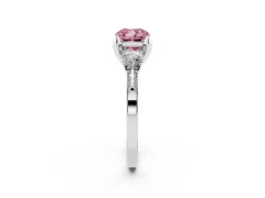 Fancy Pink Cushion Cut Diamond Three-Stone Ring Set in Platinum with Pavé Band and Smaller Side Stones