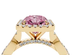 Fancy Pink Radiant Cut Diamond Halo Twist Band Solitaire Ring Set in Yellow gold with Prong Setting