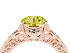 Fancy Yellow Round Cut Diamond Halo Ring Set in Rose gold with Channel Set Band and Prong Setting