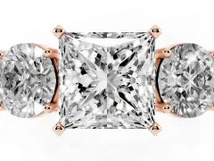 Princess Cut Diamond Three-Stone Ring Set in Rose gold with Round Side Stones and Classic Band