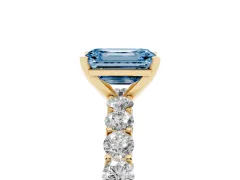 Fancy Blue Emerald Cut Diamond Solitaire Ring Set in Yellow gold with Shared Prong Pavé Band