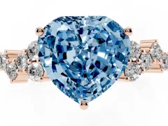 Fancy Blue Heart Cut Diamond Ring Set in Rose gold with Scattered Round Accents