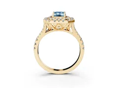 Fancy Blue Emerald Cut Diamond Double Halo Ring Set in Yellow gold with Pavé Split Shank and Prong Setting