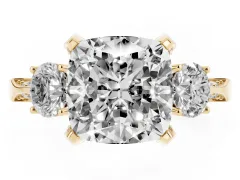 Cushion Cut Diamond Three-Stone Ring Set in Yellow gold with Pavé Band and Smaller Side Stones