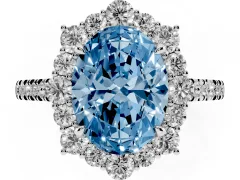 Fancy Blue Oval Cut Diamond Halo Ring Set in White gold with Pavé Band and Prong Setting