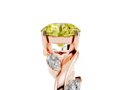 Fancy Yellow Round Cut Diamond Solitaire Ring Set in Rose gold with Twisted Marquise Accent Band