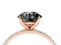 Fancy Black Round Cut Diamond Solitaire Engagement Ring Set in Rose gold with Round Pavé Band and Prong Setting