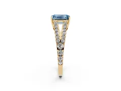 Fancy Blue Emerald Cut Diamond Split Shank Pavé Engagement Ring Set in Yellow gold with Prong-Held Center Stone
