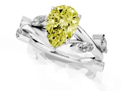 Fancy Yellow Pear Cut Diamond Solitaire Ring Set in Silver with Twisted Marquise Accent Band