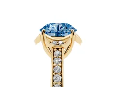 Fancy Blue Round Cut Diamond Halo Ring Set in Yellow gold with Channel Set Band and Prong Setting