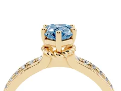 Fancy Blue Pear Cut Diamond Solitaire Ring Set in Yellow gold with Channel Set Band and Prong Setting