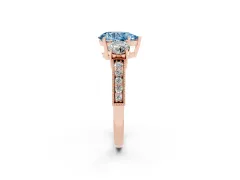 Fancy Blue Pear Cut Diamond Three-Stone Ring Set in Rose gold with Round Side Stones and Pavé Band