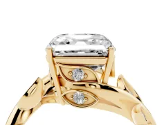Asscher Cut Diamond Solitaire Twist Engagement Ring Set in Yellow gold with Pavé Leaf Accents