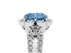 Fancy Blue Radiant Cut Diamond Floral Halo Split Shank Engagement Ring Set in White gold with Pavé Shank