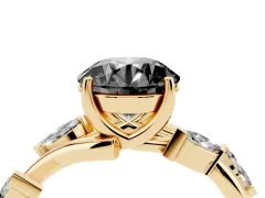 Fancy Black Round Cut Diamond Solitaire Ring Set in Yellow gold with Twisted Marquise Accent Band