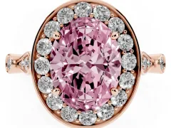 Fancy Pink Oval Cut Diamond Halo Engagement Ring Set in Rose gold with Twisted Band and Prong Setting