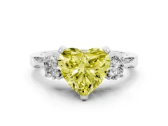 Fancy Yellow Heart Cut Diamond Three-Stone Ring Set in White gold with Pavé Band and Smaller Side Stones