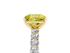 Fancy Yellow Radiant Cut Diamond Solitaire Ring Set in Yellow gold with Shared Prong Pavé Band