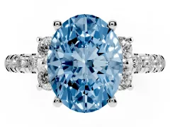Fancy Blue Oval Cut Diamond Three-Stone Pavé Ring Set in Silver with Prong Setting