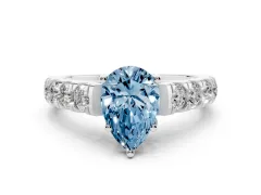Fancy Blue Pear Cut Diamond Solitaire Ring Set in White gold with Cut-Down Micro Pavé Band and Prong Setting
