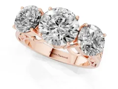 Round Cut Diamond Three-Stone Ring Set in Rose gold with Textured Band