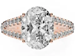 Oval Cut Diamond Split Shank Pavé Engagement Ring Set in Rose gold with Prong-Held Center Stone