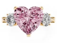 Fancy Pink Heart Cut Diamond Three-Stone Ring Set in Yellow gold with Pavé Band and Smaller Side Stones