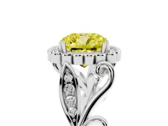 Fancy Yellow Cushion Cut Diamond Halo Ring Set in White gold with Leaf Motif Split Shank and Prong Setting