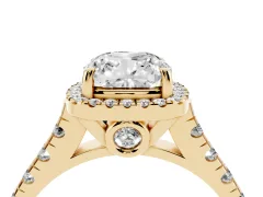 Cushion Cut Diamond Halo Engagement Ring Set in Yellow gold with Pavé Band and Prong-Set Center