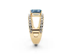 Fancy Blue Emerald Cut Diamond Split Shank Pavé Solitaire Ring Set in Yellow gold with Open Shank Design