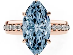 Fancy Blue Marquise Cut Diamond Solitaire Ring Set in Rose gold with Channel Set Band and Prong Setting