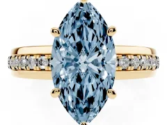 Fancy Blue Marquise Cut Diamond Solitaire Ring Set in Yellow gold with Channel Set Band and Prong Setting