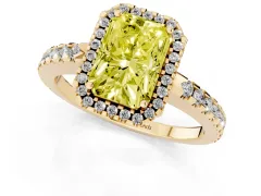 Fancy Yellow Radiant Cut Diamond Halo Ring Set in Yellow gold with Pavé Shoulders and Halo-Framed Center