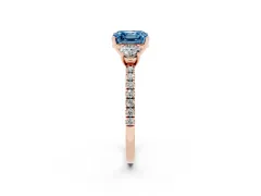Fancy Blue Asscher Cut Diamond Three-Stone Ring Set in Rose gold with Pavé Band and Graduated Sides