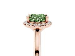Fancy Green Oval Cut Diamond Halo Engagement Ring Set in Rose gold with Pavé Band and Rising Shoulders