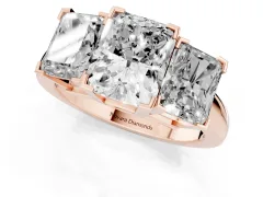 Radiant Cut Diamond Three-Stone Ring Set in Rose gold with Channel-Set Band and Prong Settings