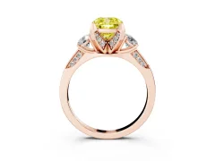 Fancy Yellow Cushion Cut Diamond Three-Stone Ring Set in Rose gold with Pavé Band and Smaller Side Stones