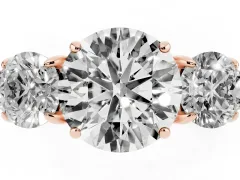 Round Cut Diamond Three-Stone Ring Set in Rose gold with Round Accent Stones and Plain Band