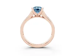 Fancy Blue Emerald Cut Diamond Bezel-Set Solitaire Ring Set in Rose gold with Channel-Set Band