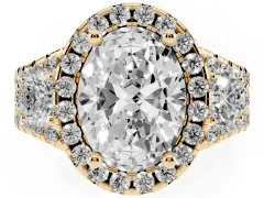 Oval Cut Diamond Halo Split Shank Ring Set in Yellow gold with Round Accent Stones and Prong Setting
