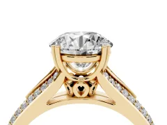 Round Cut Diamond Split Shank Pavé Engagement Ring Set in Yellow gold with Prong-Set Center Stone
