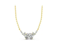 Oval Diamond Pendant Set in Yellow gold with Heart Accents and Prong Setting