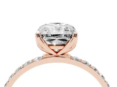Radiant Cut Diamond Solitaire Engagement Ring Set in Rose gold with Round Pavé Band and Prong Setting
