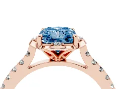Fancy Blue Radiant Cut Diamond Solitaire Ring Set in Rose gold with Pavé Band and Floral Prong Setting