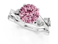 Fancy Pink Round Cut Diamond Solitaire Ring Set in Silver with Twisted Marquise Accent Band
