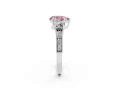 Fancy Pink Pear Cut Diamond Three-Stone Ring Set in Platinum with Round Side Stones and Pavé Band