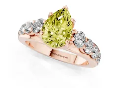 Fancy Yellow Pear Cut Diamond Pavé Engagement Ring Set in Rose gold with Prong Setting