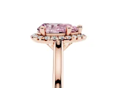 Fancy Pink Pear Cut Diamond Halo Engagement Ring Set in Rose gold with Pavé Band and Rising Shoulders