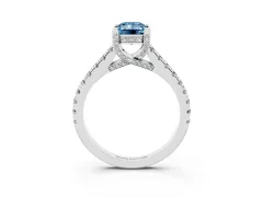 Fancy Blue Emerald Cut Diamond Solitaire Ring Set in Platinum with Brilliant Pavé Band and Prong Setting