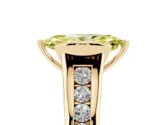 Fancy Yellow Marquise Cut Diamond Bezel-Set Solitaire Ring Set in Yellow gold with Channel-Set Band